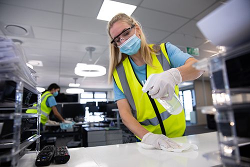 woman wearing hi vis vest and face mask cleaning t 2021 08 29 17 14 57 utc