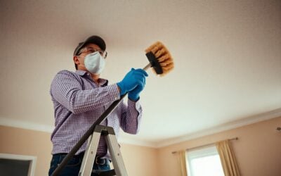 What is the best way to clean popcorn ceilings?